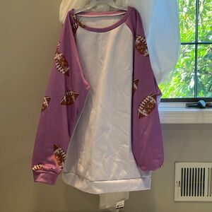 Women’s Pink and white football sleeve pattern sweat shirt size XL Never worn